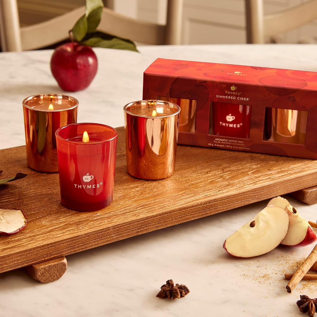Thymes Aromatic Votive Trio – Set of Three Votive Candles – Luxury Home Fragrance – Scented Candles with Notes of Freshly Pressed Apple, Clove, & Cardamom – Red & Rose Gold (Simmered Cider, 2 Oz Each)